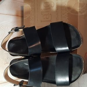 Latigo brand clog style black leather sandals. Size 9, gently worn